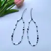 Mismo Estilo Xiaohongshu Cadena para Teléfono de Cuentas de Arroz Azules y Negras Colgante Lanyard para Funda de Teléfono Ins Cadena para Teléfono Universal Modelo Nuevo D