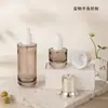 En Stock Loción de Gama Alta Esencia Tónico Botella Transparente Gris Recargable 100g Crema Crema Facial Botella Vacía de Vidrio Material de Empaque