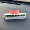 Lindo letrero de número de teléfono para estacionar con un moño, un permiso de estacionamiento creativo y elegante para tu coche, una decoración interior para cuando estés estacionado