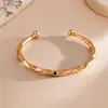 Pulsera metálica abierta redonda brillante transfronteriza europea y americana, moderna, de lujo ligero, sensación de alta gama, joyería personalizada y elegante para mujer