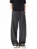 Pantalones casuales sueltos de estilo retro americano para hombre, sencillos y versátiles, con caída, corte recto, textura de espiga y estilo "old money".