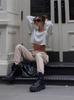 Ropa Nueva Transfronteriza Rusa para Mujer Europea y Americana Sexy Chica Caliente de Punto que Muestra el Ombligo Prendas de Punto Caladas de Hombros Caídos para Mujer