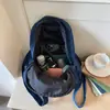 Bolsa de Ombro Dupla em Jeans Literário Japonês Feminina 2026 Nova Mochila Casual para Estudante Universitário Mochila de Viagem para a Escola ins Niche