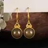 Nuevos ganchos para orejas de estilo chino retro de alta calidad, imitación de jade Hetian para mujer, adecuados para cheongsams, Hanfu y faldas tradicionales de cara de caballo color humo púrpura