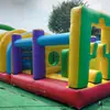 Carrera de obstáculos inflable multinivel, equipo de diversión inflable para exteriores con temática de arcoíris, equipo inflable para actividades de team-building