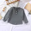 Camiseta interior de cuello redondo acanalada de terciopelo para primavera y otoño, ropa interior para niños y niñas, camiseta de manga larga para bebé, tops versátiles de estilo extranjero