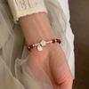 Pulsera con colgante de flor de ágata roja para mujer, regalo de nicho de alta gama para mejores amigas, pulsera de cuerda trenzada estilo chino nuevo