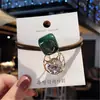 Versão coreana de Dongdaemun cabeça corda oco cristal anel de cabelo net vermelho explosões de cabelo elástico corda de cabelo acessórios de cabelo atacado