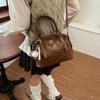 Bolsas de mão texturizadas de cor pura para mulheres 2025 outono e inverno novo estilo estilo estrangeiro bolsa de ombro da moda estilo estrangeiro roupas de trabalho crossbody