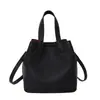 Bolso de cubo popular de moda de verano 2026 nuevo bolso cruzado versátil de moda para mujer para ir al trabajo y salidas bolso de mano pequeño