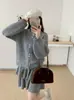 Conjunto de Suéter Estilo Suave Coleção Outono/Inverno 2026: Conjunto de Duas Peças: Cardigã de Tricô com Laço nas Costas + Saia para Mulheres