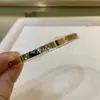 Pulseira de amor CNC alta qualidade estreita média larga novo estilo grossa banhada a ouro rosa 18K pulseira de pulso para casal transfronteiriça