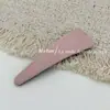 Pinza para el pelo de tela geométrica de color liso simple estilo coreano con un tacto de alta gama, pinza BB colorida para flequillo lateral y cabello de la parte trasera de la cabeza