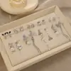 Brincos de Luxo Modernos com Design Único que Emagrecem Rostos Redondos, Brincos Versáteis de Estilo Francês para Mulheres, Atacado