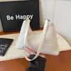 Bolso Tote Pequeño de Alta Gama de Moda para Mujer 2025 Nuevo Estilo con un Diseño de Hombro Casual Minimalista Elegante y Único