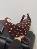 Bolso de Mujer Resistente con Remaches Ojillados Transfronterizos Estilo Punk 2025 Moda Europea y Americana Nuevo Bolso de Hombro Único, Bajo el Brazo, Cruzado