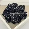 Coletero floral estilo coreano, elegante estilo retro, para moño o coleta, con diseño de flor y plisado. Banda elástica para mujer.