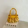2026 Verano Nuevo Estilo Coreano Nicho Chic Simple Bolso de Hombro Plisado para Mujer para Viajar al Trabajo Personalidad de Moda Bolso de Axila para Mujer
