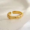 Anillo abierto de lujo de nicho con forma de iris hecho de aleación de cobre, chapado en oro real, acabado cepillado, incrustado con circonita, anillo ajustable con un tacto de alta gama