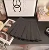 Novedad Otoño 2026 para Niñas Cárdigan de Punto Falso de Dos Piezas Estilo Academia Falda Plisada Versátil Conjunto de Dos Piezas con Falda Plisada Moderno