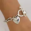 Pulseira de Metal Punk Punk Europeia e Americana Transfronteiriça Estilo Simples Retrô com Senso de Design Fivela Ot Pingente de Coração Pulseira para Mulheres