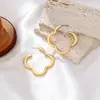 Brincos Europeus e Americanos Transfronteiriços Vazados de Trevo de Quatro Folhas com Design Único, Flor, Borboleta, Coração e Mapa Africano Acessórios de Orelha para Mulheres