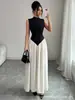Vestido de Lujo Ligero Estilo Francés Transfronterizo Europeo y Americano 2026, Bloques de Color Blanco y Negro, Cuello Semi Alto, Sin Mangas, Ceñido a la Cintura, Vestido Largo Elegante