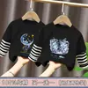 Ropa infantil, camiseta de algodón de manga larga para niños, para primavera y otoño, nuevo modelo 2026, camiseta base de imitación de dos piezas para niños talla mediana y grande