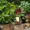 Lámpara de viento navideña de estilo nuevo transfronteriza, lámpara de vela, lámpara de vela de hierro con lazo europeo, decoración de diseño de escena navideña