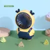 Nuevo ventilador de mano de dibujos animados portátil para exteriores con carga ventilador pequeño para estudiantes niños ventilador eléctrico venta al por mayor de fábrica