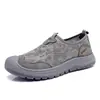 Sapatos Masculinos 2026 Novo Modelo Esportivos Casuais Diários Tênis Bico Redondo Slip-On Sapatos Preguiçosos Malha Respirável Sapatos Únicos