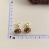 Pendientes vintage marrones estilo Maillard, pendientes de viñeta irregular con temperamento estilo Hong Kong, pendientes de moda francesa de gran sentido.