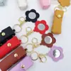 Nuevo Espejo de Maquillaje Portátil con Flor para Labial, Bolso de Labial de Moda, Regalo de Cuero, Colgante Pequeño, Llavero para Niñas