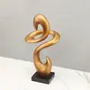Adorno moderno minimalista de resina con doble gancho y diseño de línea retorcida para sala de estar, entrada, estudio y decoración de escritorio del hogar