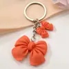 Colgante Nuevo de Primavera Color Caramelo Lazo de Amor Flor Letra Colgante Llavero Transfronterizo Día de San Valentín