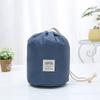 Versión coreana de bolsa de cosméticos de gran capacidad, bolsa de aseo, bolsa de almacenamiento de viaje multifuncional, bolsa de almacenamiento cilíndrica con cordón, ventas directas de fábrica