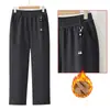 Pantalones de algodón cálidos engrosados para mamá, pantalones de pierna recta, nuevo estilo de invierno 2026, pantalones para mujeres de mediana edad y mayores, pantalones de pierna recta engrosados de cintura alta con terciopelo