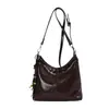 Nueva colección otoño/invierno 2026: Bolso de mano coreano simple, retro, moderno y versátil con un toque de alta gama, diseñado para mujeres, y se puede llevar como bandolera o bolso de hombro