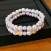 Exquisito brazalete de flor de cuentas de doble capa estilo francés con perlas, un accesorio lujoso y de alta gama, perfecto para el uso diario y un estilo versátil.