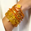 Conjunto de pulseiras de férias estilo boêmio transfronteiriço europeu e americano, pulseira multicamadas com sementes, concha e estrela-do-mar