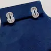 Aretes de oro de 18 quilates de Fred incrustados con diamantes con diseño de nudo doble y elegante collar con borla en forma de pera, un toque de lujo y moda