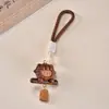 Madeira de nogueira criativa incrustada com pingentes de cachorro em formato de lingote esculpido, um pingente de chaveiro, um acessório de bolsa, um artesanato em madeira, fofo e divertido