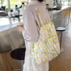 Bolsa de mano de algodón floral estilo coreano, un bolso versátil y elegante que se puede llevar en la mano o colgar al hombro, perfecto para estudiantes mujeres, ligero y con gran capacidad, ideal para llevar libros a clase
