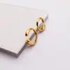Ins estilo francés nicho irregular metal redondo simple anillo acero titanio chapado color oro 18K protección anillo de acero titanio