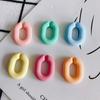 Accesorios de joyería DIY al por mayor nuevo color caramelo forma ovalada anillo abierto llavero material