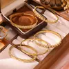 Pulsera Chapada de Nuevo Producto con Patrón de Diamante de Alta Venta Estilo Europeo y Americano Corazón de Acero Inoxidable Incrustado con Circonita de Imitación Joyería Dorada