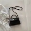 Bolsa de Mão Elegante de Alto Acabamento para Mulheres 2026 Nova Moda Primavera Bolsa de Ombro Casual Bolsa Transversal de Nicho para o Dia a Dia