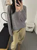 Suéter de punto de seda y cachemira con cuello en V y diseño calado para mujer, nuevo de otoño, de manga larga, corte holgado, versátil, suave y fino