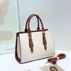Bolsa de mão casual color block personalizada, item de venda quente transfronteiriça para mulheres, novo modelo 2026, grande capacidade, bolsa de ombro versátil para o dia a dia
