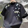 Camiseta floral bordada de manga corta, moderna para el verano, unisex, corte holgado, versátil, casual, cuello redondo, top de media manga